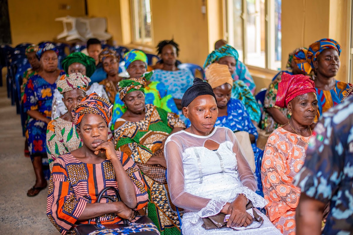 Women seated in rows at a foundation gathering.